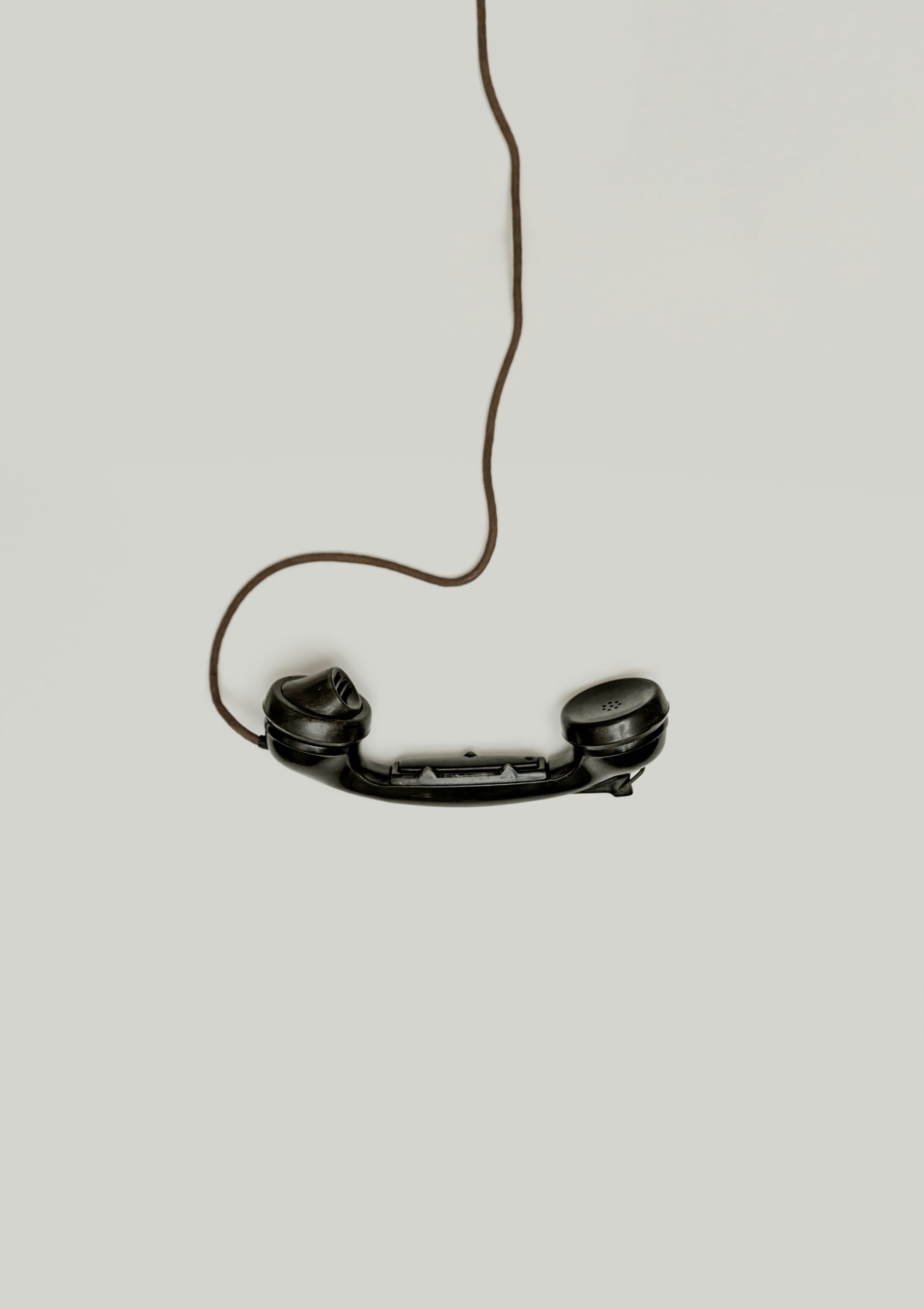 A telephone handset resting on a surface